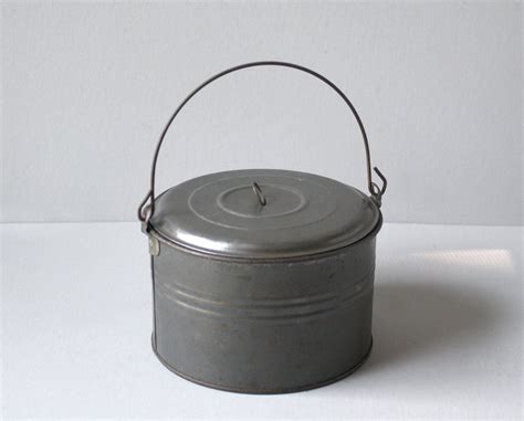 Lunch pail - Antique Coal Miner's Lunch Pail, Antique Metal Lunch Box, Metal Lunch Box, Miner's Lunch Box, Leonard Lunch Box, Primitive Lunch Box, Rustic (1.4k) $ 79.00. Add to Favorites 17th-18th Century Fur Trade Era Bronze Handled Graduated Kettles Wok Style Candy (2.7k) $ ...
